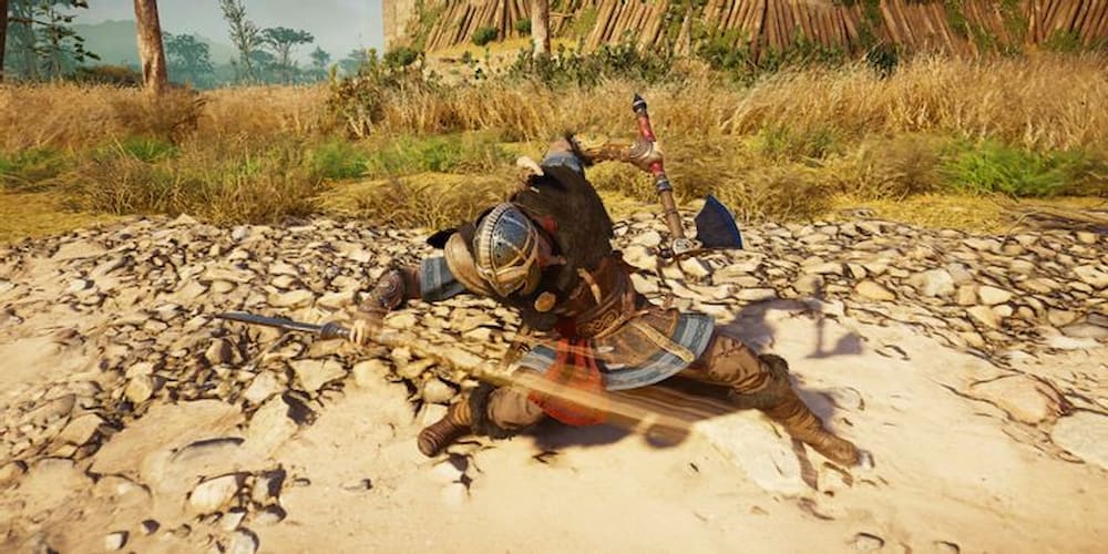 Creed Valhalla arma na mão secundaria
