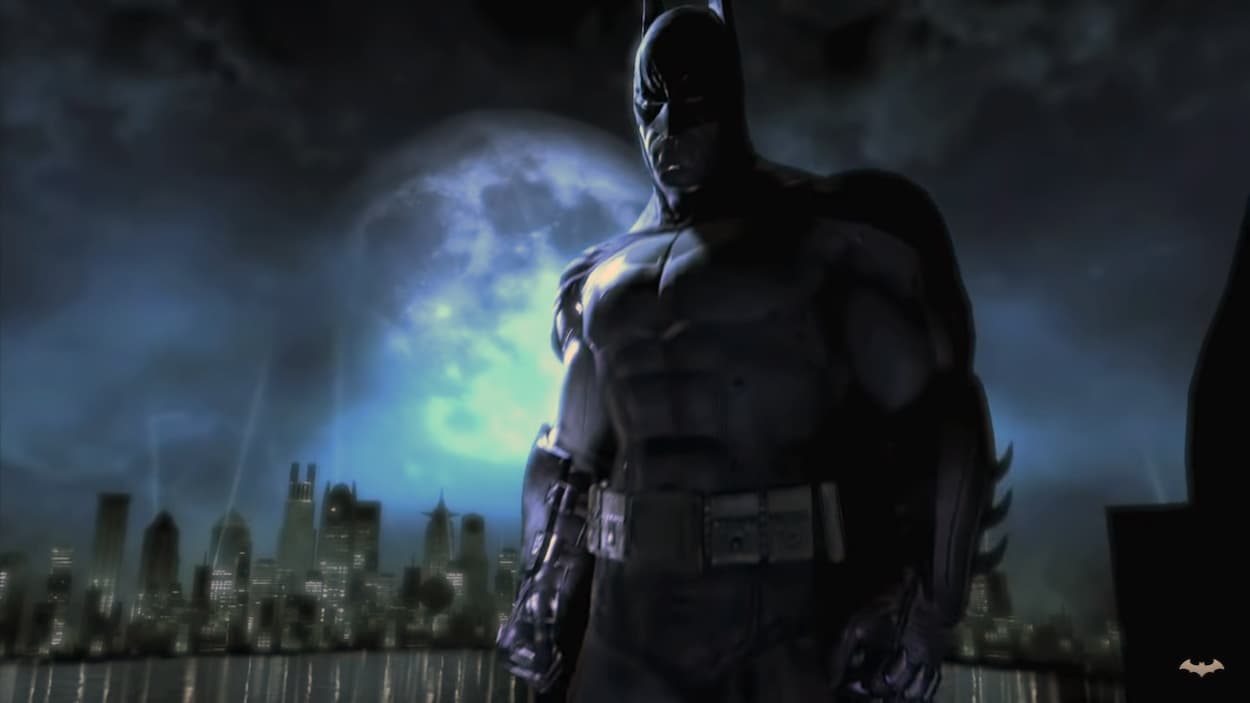Batman em topo de prédio e luar ao fundo