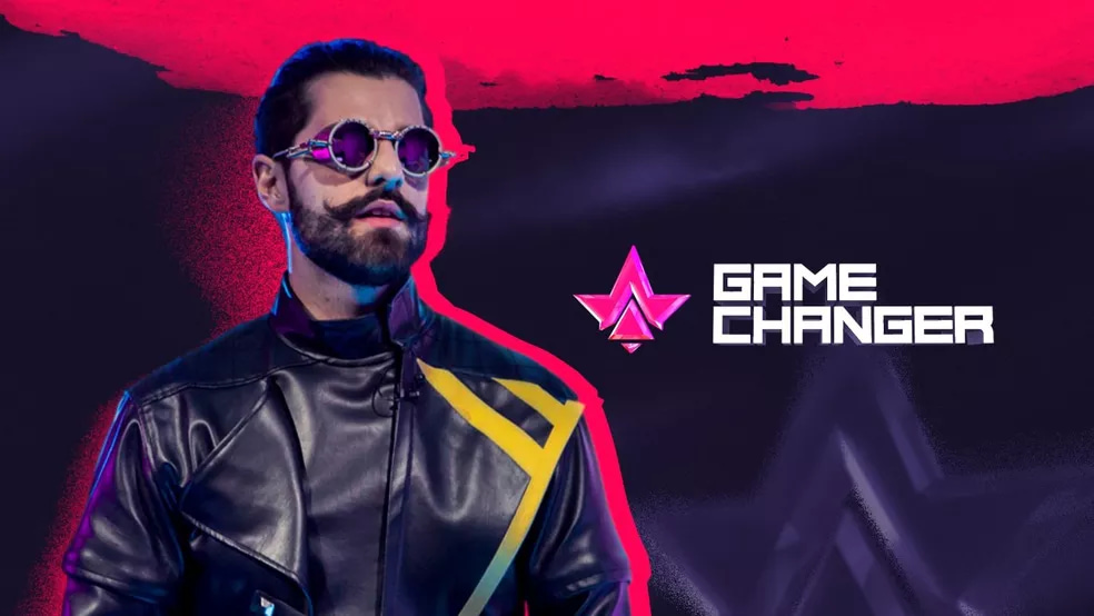 Foto do Alok, escrito GameChander do seu lado direito junto com a logo do mesmo.